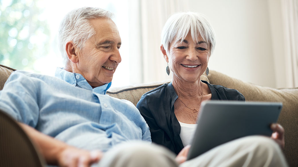 Care-Senior-Couple-Using-Their-Tablet.jpg